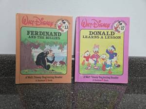 lot 348 image: Walt Disney Fun-to-Read Library 2 Book Lot Ferdinand and the Bullies Volume 13 Donald Learns a Lesson Volume 17
