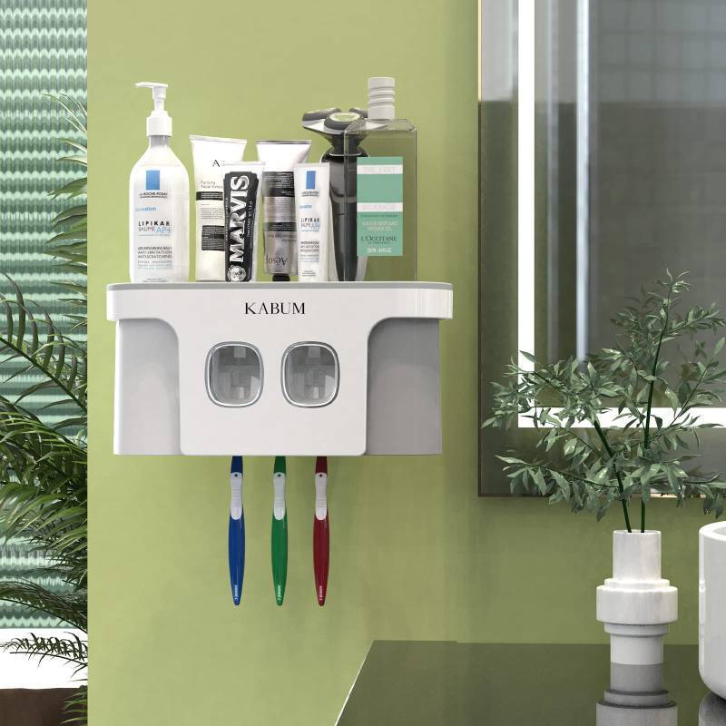 lot 1108 image: Toothbrush Holders for Bathrooms Toothpaste Dispenser - 2 Cups Automatic Toothpaste Squeezer Wall Mounted, Ideal Bathroom Accessories Organization Retail $25