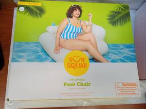 lot 2067 image: Sun Squad Inflatable Pool Chair 45-14 in L x 24 in H Built-in Cup Holder - Retail $20