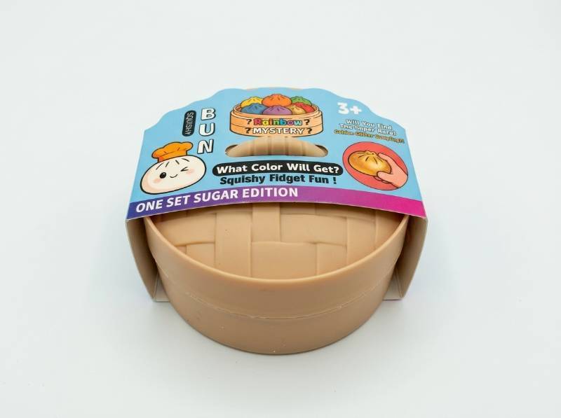 lot 52 image: Squishy Bun Rainbow Mystery Steamer Basket Fidget Toy Sugar Edition