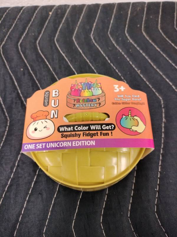 lot 55 image: Squishy Bun Rainbow Mystery Unicorn Edition Squishy Fidget Toy Set