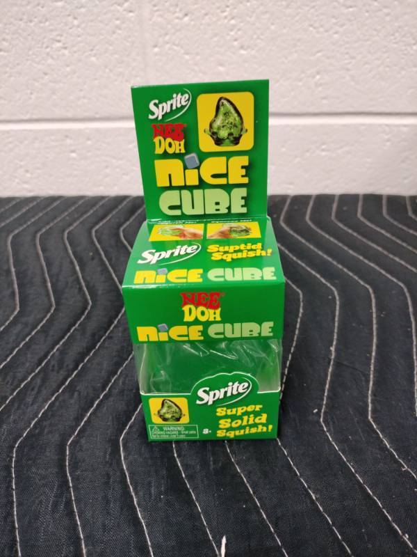 lot 58 image: Schylling NeeDoh Sprite Nice Cube Squishy Drop Super Solid Squish Toy