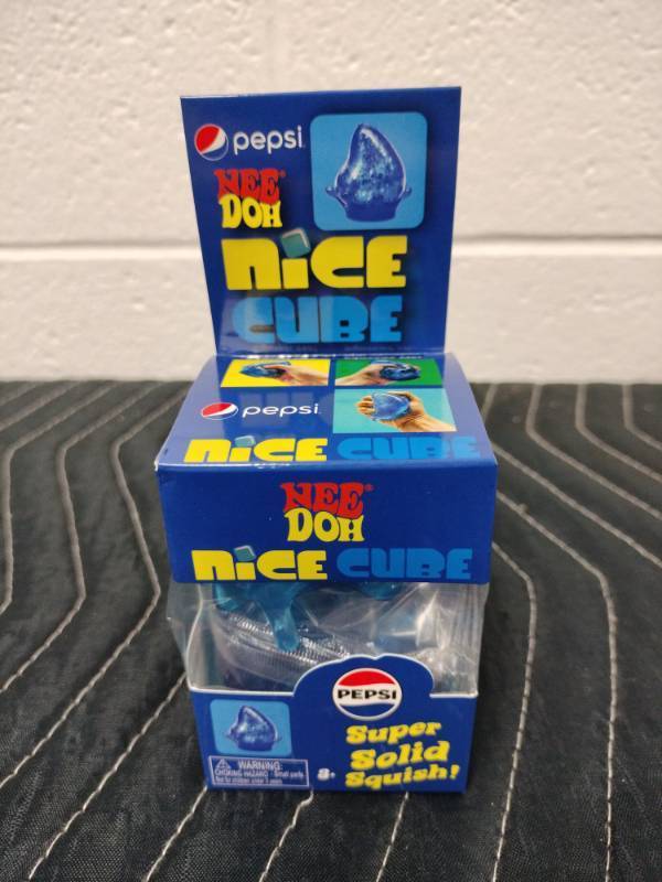 lot 59 image: Schylling NeeDoh Pepsi Nice Cube Squishy Drop Super Solid Squish Toy