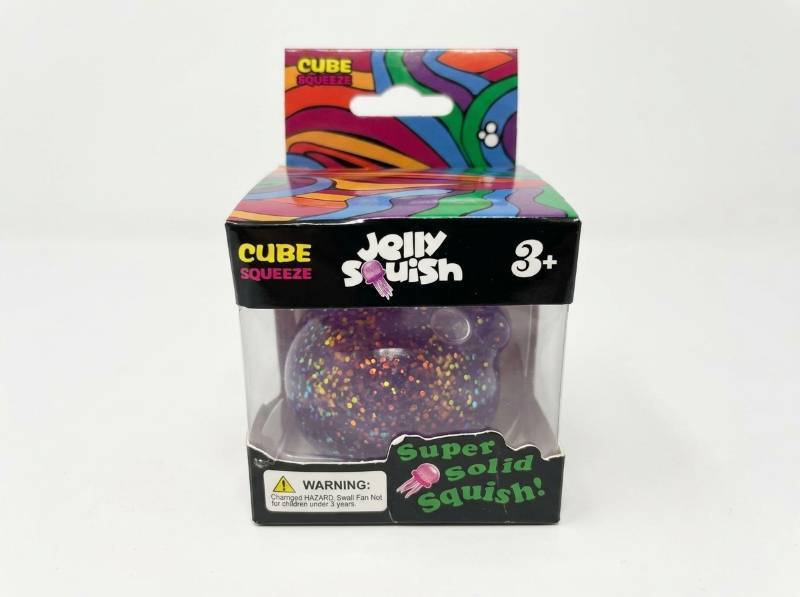 lot 92 image: Cube Squeeze Jelly Squish Purple Glitter Jellyfish Squeeze Toy Ages 3