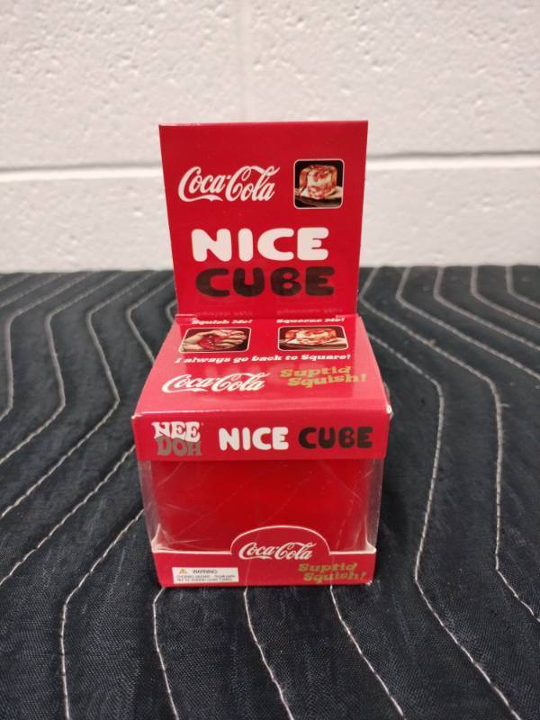lot 116 image: NeeDoh Nice Cube Squish Toy - Coca Cola