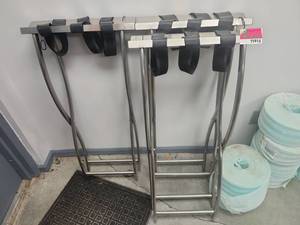 lot 21914 image: (3) Brushed Stainless Steel Folding Luggage Racks w Black Straps