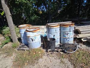 lot 21960 image: (4) W. R. Meadows Mel-Rol LM 55-Gallon Steel Drums
