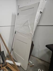 lot 21968 image: Prehung White 2-Panel Interior Door with Black Hinges and Jamb