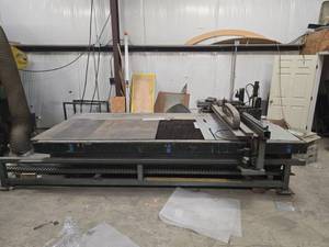 lot 8791 image: CNC Plasma Cutting Table with Gantry, Cable Carriers and Slatted Cutting Bed (RIGGING FEE OF $2,240 WILL BE ADDED TO YOUR INVOICE)