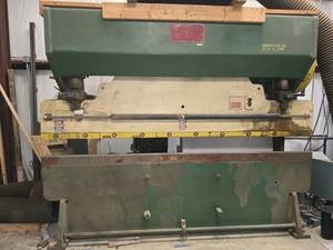 lot 8792 image: Chicago Mechanical Press Brake with Flywheel Guard and Side Control Boxes  Model 810-L (RIGGING FEE OF $2,576 WILL BE ADDED TO YOUR INVOICE)