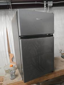 lot 8815 image: Hisense Two-Door Compact Refrigerator with Top Freezer Compartment