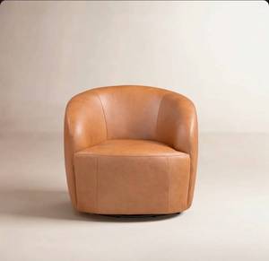 lot 106 image: Alma Genuine Italian Leather Swivel Lounge Chair in Bourbon Tan - Retail $953