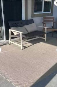 lot 21148 image: 7x10 Natural Woven Rectangular Outdoor Area Rug Heathered Cream - Threshold PatioPolypropylene Beige Textured Area Rug - Retail $200