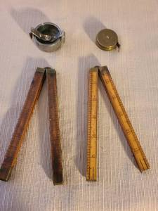 lot 1020 image: 2 Vintage round metal pocket tape measures and 2 wooden folding rulers