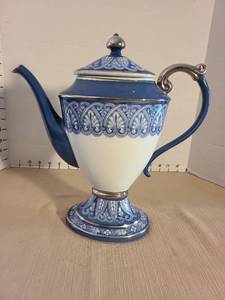lot 1036 image: Blue and White Ceramic Teapot with Metal Trim and Lid by Bombay Company
