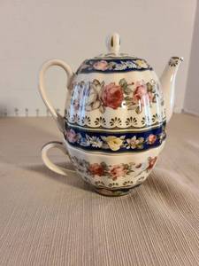 lot 1037 image: Porcelain Stacked Teapot Tea For One Set with Floral Decoration
