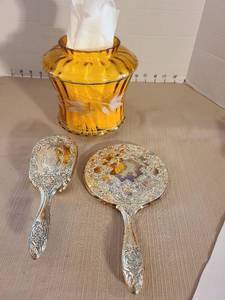 lot 1046 image: Ornate silverplated vanity mirror and matching  brush, plus an amber glass vasetissue holder