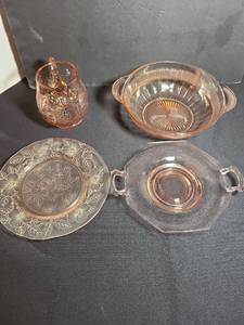 lot 1058 image: Pink depression glass owl pitcher, serving bowl, serving plate and dinner plate.