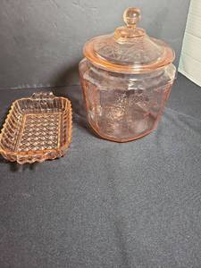 lot 1060 image: Pink depression glass covered cookie jar and geometric pattern relish dish