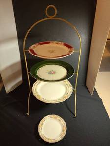 lot 1064 image: Tiered dessert stand with plates