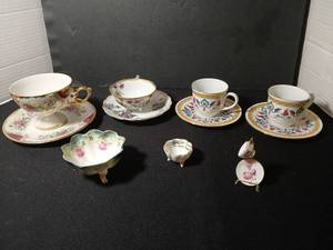 lot 1085 image: Porcelain Tea Cup and Saucer  Pieces Floral Decorated