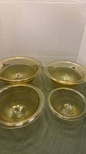 lot 1104 image: Vintage Federal Glass Golden Glow ribbed nesting mixing bowls
