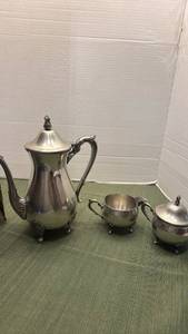 lot 1111 image: Schohous pewter coffee pot and creamer and sugar dish, coffee pot needs repaired and has missing foot