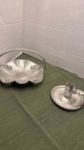 lot 1112 image: Aluminum candy dish featuring a scalloped floral design and a twisted metal handle and Continental Hand Wrought Silverlook 712 Candleholder