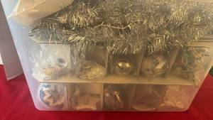 lot 1220 image: Ornaments, garland and more in plastic storage tub