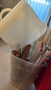 lot 1229 image: Wrapping paper in plastic storage container