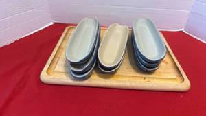 lot 1409 image: Wooden cutting board and 8 corn on the cob dishes
