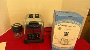 lot 1425 image: Hamilton Beach 2 slice toaster, electric chopper and water carafe