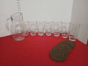 lot 1437 image: Glass Pitcher and Drinking Glasses Setwith cork style coasters