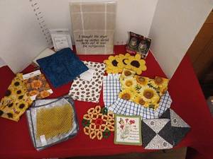 lot 1439 image: Kitchen Towel and Decor Lot with Sunflower Coffee Bean and Floral Prints