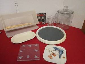 lot 1445 image: Kitchen Lot Glass Jars Salt Pepper Shakers trivets Utensil  storage Box with lid