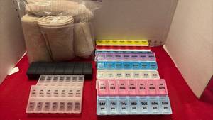 lot 1541 image: Pill organizers and more
