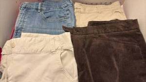 lot 1554 image: Ladies jeans and capris. Size 14.