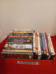 lot 1603 image: DVD Movie Lot  Titles Including Pirates Caribbean, and  Cocoon
