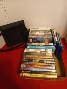 lot 1605 image: Lot of DVD Movies Including Doctor Zhivago, King Kong, Amistad, Lion Witch with carrying case