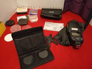 lot 1646 image: Neewer Speedlite 750II Flash For Nikon with Accessories Bundle