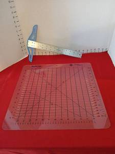 lot 1722 image: June Tailor Shape Cut Rotary Cutting Mat and Ruler Set