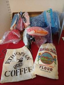 lot 1753 image: Basket Filler Shredded Paper Lot with Decorative Drawstring Bags