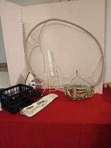 lot 1770 image: Antique  Clothes pin in bag, iron, iron board holder and more