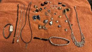 lot 1900 image: Ladies jewelry including charm bracelet and more