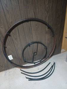 lot 2100 image: Outdoor Table frame missing glass  table top located  basement needs put togather