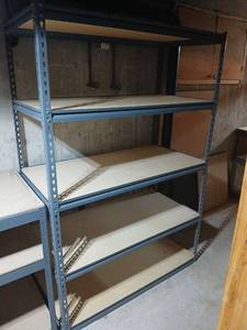 lot 2103 image: Gorilla Shelves Industrial Storage Shelving Unit Steel Frame 6ftx4ftx2ft located in basement.  Winner bring tools and help to haul