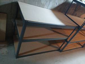 lot 2104 image: Gorilla Shelves Metal Frame 3ftx4ftx2ft with additional  hardware located in basement
