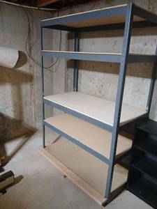 lot 2107 image: Gorilla Shelves Industrial Metal Frame Shelving Unit 6ftx4ftx2ft located in basememt winner bring tools and or help to haul