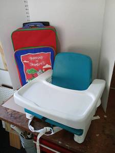 lot 3026 image: Portable Booster Seat with Tray and Going to Grandmas Suitcase