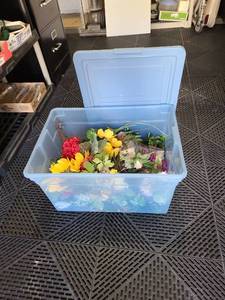 lot 3234 image: Rubbermaid  tote with faux flowers